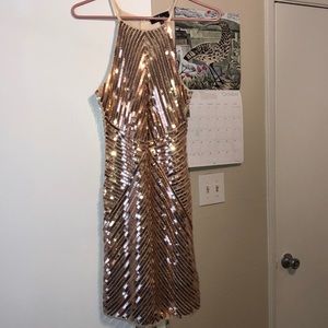 Fitted gold sequence dress
